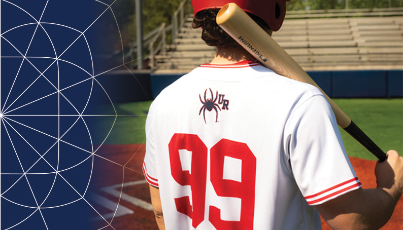 Someone holding a bat over their shoulder while wearing our Baseball Jersey