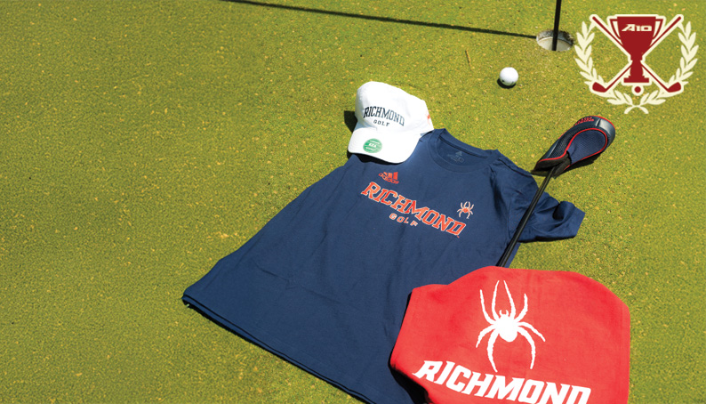 A golf course with Richmond Merchandise laying on the green