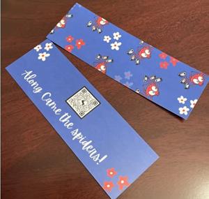 Along Came the Spiders Double Sided Laminated Bookmark